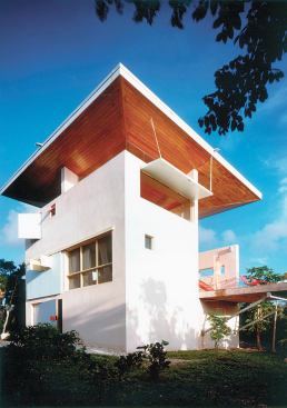 The roof of the Taylor House shelters the habitable spaces below like a giant umbrella. It also funnels rain into cisterns for drinking water.