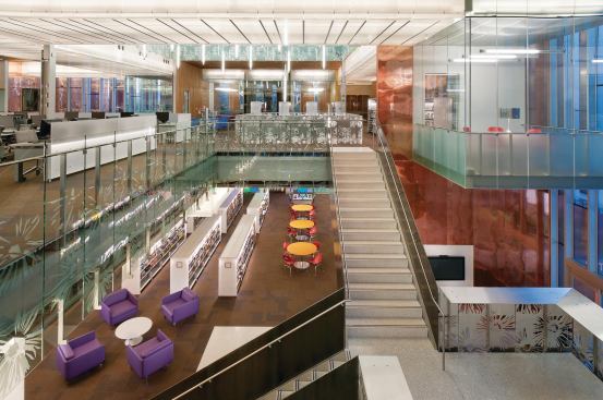 Fully glazed interior walls connect it to the main library space. The public library that occupies the ground level is capped by the second-level college library. The two are connected with stairs clad in water-jet-cut aluminum.