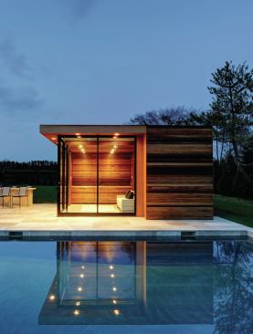 Designed to look like a detached fragment of the main building, the pool house doubles as a guest suite.