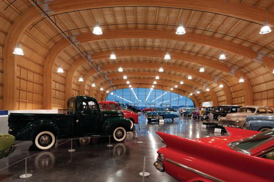 Nineteen glulam beams arc 104 feet above the exhibit floor.