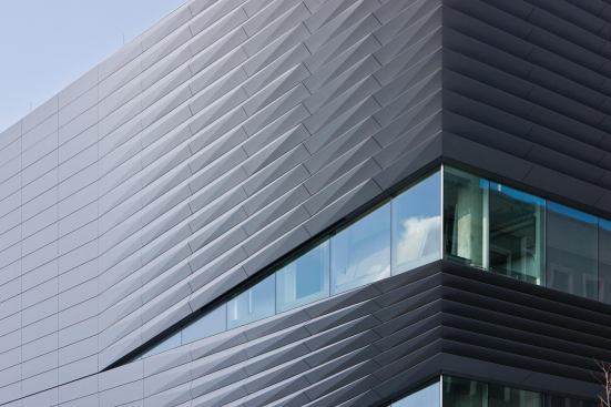 The back of the zinc composite material was V-grooved with a CNC router and folded. 