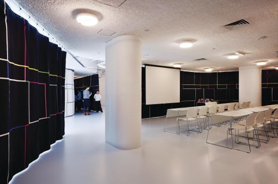 The curtain designed by textile-artist Cindy Sirko can be seen here.
