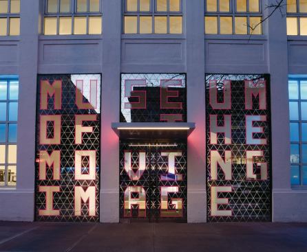 The only substantive changes to the historic façade are the new canopy and magenta-and-gold supergraphics that mark the main entrance.