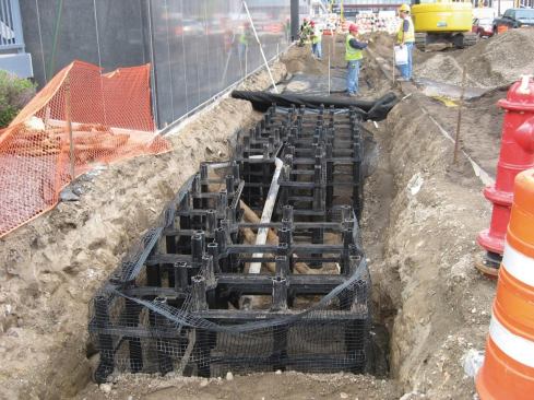 #15 DeepRoot Partners Stormwater Management System  The Silva Cell modular system holds soil for tree growth and stormwater management while supporting paved surfaces. The system holds 10 cubic feet of soil per unit, protecting tree roots from compaction and providing room for stormwater infiltration and surrounding utilities. The 48-by-24-by-16-inch fiberglass and polypropylene cells have galvanized steel supports and can be stacked up to three cells high and laterally as wide as necessary before the decking is attached. 800.458.7668. 
www.deeproot.com. 
