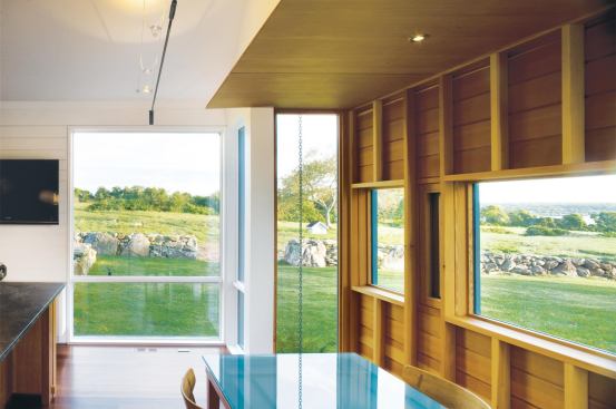 The more transparent kitchen addition frames farmland views.


