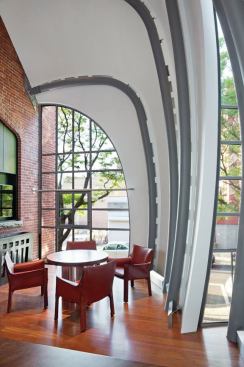 Beneath the continuous shell of the outer structure, wire lath, stucco, and membrane water systems ensure that not a drop of water enters the addition. 