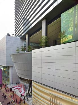 Entance to the lower retail podium, flanked by anchor stores, such as Apple.