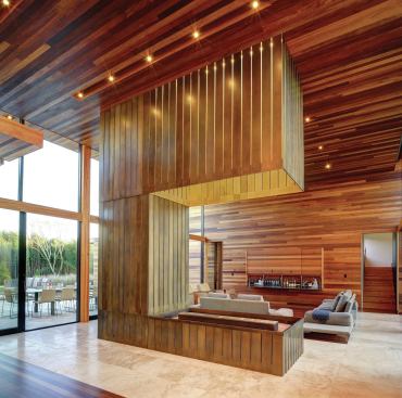 Because the alcohol-burning fireplace requires not exhaust to the outdoors, its hood leads to a skylight rather than a chimney.