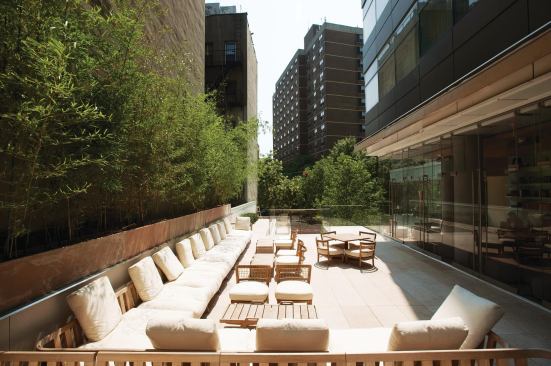 The terrace off the second floor bar creates an outdoor space where guests can relax above the hubbub of the Manhattan streetscape. The site’s odd shape and Zapata’s attempts to lessen the building’s impact at ground level resulted in a series of interstitial spaces, like this one, that Zapata was able to reclaim and turn into public zones.
