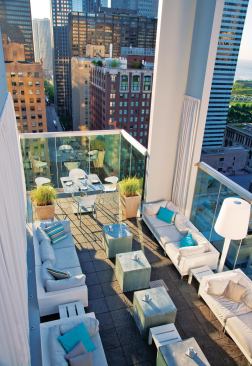 A small, private outdoor terrace off the roof-level restaurant is perched on the building’s southeast corner. To complete the line of the building when viewed from below, a concrete frame brackets the space.