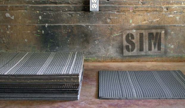 Tricycle's SIM carpet samples duplicate the appearance of carpet on paper. The results are so realistic that it is difficult to distinguish the difference between the SIM and the carpet when they are side by side.