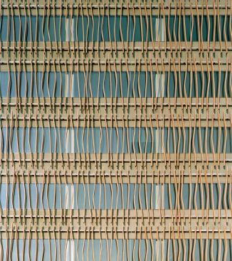 White oak sunshading blades - Sentinel Structures - www.sentinelstructures.com 

Glue-laminated timbers - Custom curve applied to the forms during manufacturing - Strictly adheres to ANSI standards


VE1-2M 1-inch insulated glazing unit with 10 percent ceramic frit - Viracon - www.viracon.com

Low-E insulated glass panels - Allows 67 percent visible light transmittance, 29 percent solar transmittance - Variety of tinting and fritting options


Green-tinted precast concrete spandrel panels with mica flakes - Artex Systems

Prefabricated spandrel panels - Mica flakes suspended in the concrete - Concrete can be tinted to variety of standard or custom colors