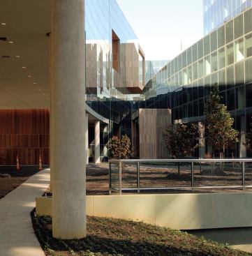 Workspaces are situated near the windows on the perimeter and the interior building's courtyard to maximize daylighting for the workers.