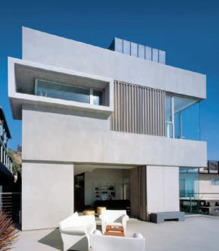 residential architect, sept/oct 2007  mussel shoals house, ventura, calif.  designARC   Dion McCarthy and Mark D. Kirkhart principals at L.A.'s DesignARC&nbsp;liken the overall scheme for this beach house to a coconut. “It has a rough exterior that stands up to the elements, but the interior is soft,” McCarthy says. Steel-troweled stucco and cold-rolled steel make up the home's shell. The salty ocean air quickly rusted the steel and drew the lime out of the stucco to form a weathered patina. “We liked playing with the site's impact on the design via those natural forces,” he adds. For all its serenity, the house is tough enough to handle both stormy weather and the sometimes-prying eyes of passing surfers. Sliding louvers and storm panels enable the owners to completely close it up when they leave for the week, ensuring safety and privacy.