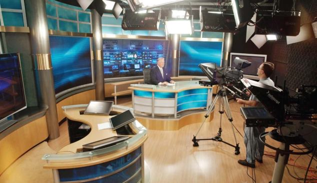 The newspaper is not the only tenant in the building. The local news channel, SNN Channel 6, has a blackbox studio from which they broadcast the nightly news. The inclusion of the soundstage in the building allows ready access to the newsrooms and research departments for the evening's stories.