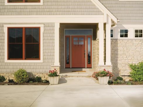 Therma-Tru.

 Entry doors in the Classic-Craft Canvas Collection are made with smooth fiberglass and shipped ready to paint. The Energy Star–certified doors come in five styles—two-panel square top, two-panel plank soft arch, four-panel arch top, five-panel, and one-panel plank Craftsman—and with a range of glass options, including 11 low-E models. 800.843.7628. www.thermatru.com.