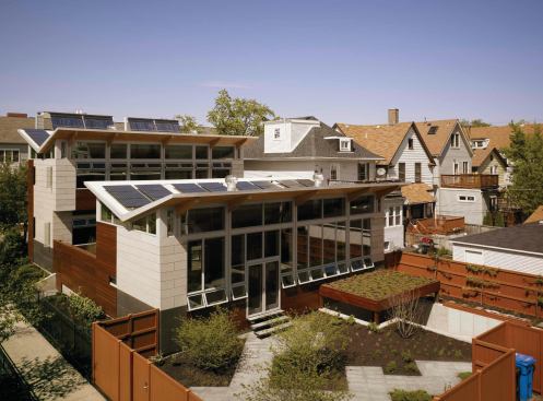 Aerial View (from South West corner of site) 

Featuring PV and Solar Thermal- two wings were designed to maximize southern exposure for increased heat gain during winter months.