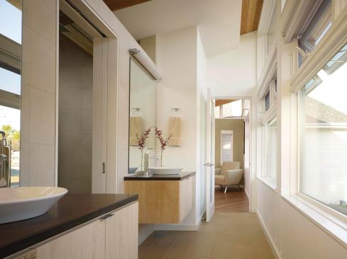 North Wing, View West through Second Floor Shared Master Bath to Guest Room.  The home uses the first residential grey water system in Chicago that reuses washing machine water to flush toilets.