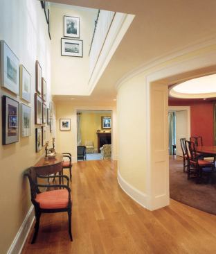 An addition and renovation opened this center-hall Colonial to its double lot - a rarity in Washington, D.C. Muse reoriented all the rooms to face that side of the property and extended the porch through the west-facing site.