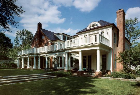 An addition and renovation opened this center-hall Colonial to its double lot - a rarity in Washington, D.C. Muse reoriented all the rooms to face that side of the property and extended the porch through the west-facing site.