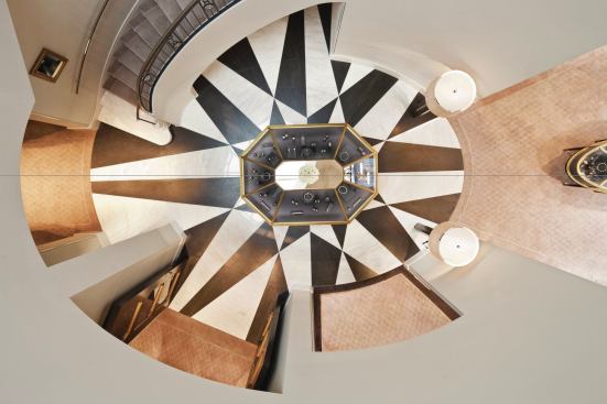 A view to the first floor from the skylight above.