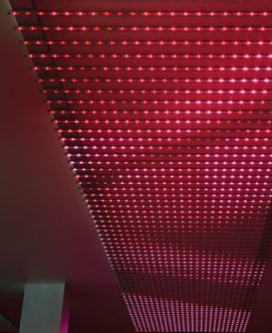 Lumen, a nightclub in Chicago's Fulton Market District, features a custom-made LED ceiling luminaire that is approximately 42 feet in length and 16 feet in width. 