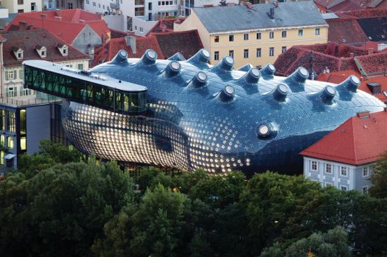 Realities:United's first use of light as a medium was BIX, a communicative display system designed for the Kunsthaus in Graz in 2003. A custom-designed software program controls the intensity of light from each of the 930 circular fluorescent tubes arranged in a grid on the east facade.