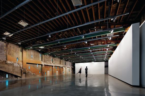 The column-free, second-floor gallery space can be configured for different purposes by moving the 57-foot-long, 13-foot-high suspended wall.