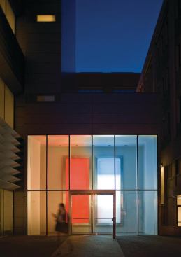 "2x5 (Brothers) in 2012, on the campus of Brown University in Providence, R.I., explores the role of time. Two backlit light boxes, each containing colored canvases, rotate on mechanical poster scrollers, which move according to a series of algorithms synchronized to the university's calendar.
