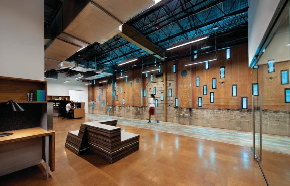 At night, the 177 custom laminated glass blocks that perforate the buildings exterior are illuminated by LEDs.