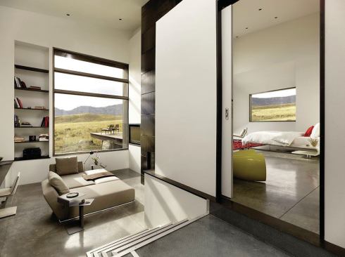 Changes in floor elevation create distance between the study and master bedroom.