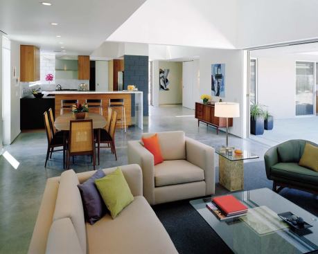 Reynolds speced cabinets to the ceiling because "aesthetically, it creates a more elegant look and it prevents dust [from] collecting in an empty space." He and his mother quibble about the stepladder she must use to reach the top shelf. "She complains, b