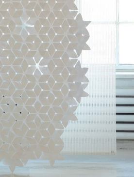 Flake

Woodnotes

www.woodnotes.fi

Flake elements are sixpointed, star-shaped cutouts made of Tyvek

Pieces fit together with no glue or adhesive

Completed panels can be used as drapery or room dividers Designed by Mia Cullen