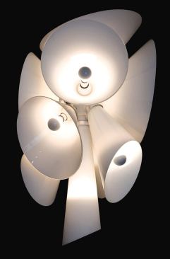 Nebula Flos www.flos.com Suspended fixture Diecast aluminum body with blown glass cones Fixture requires either 100-watt incandescent or 75-watt halogen lamps Designed by Joris Laarman