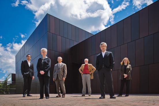 Expanding the Benedicta Arts Center was a team effort. Pictured from left are architect Andrew Weyenberg; Sister Colman O'Connell, Jim Fredricks, and Tom Darnall of the College of St. Benedict; and architects E. Tim Carl and Jamie Milne-Rojek.