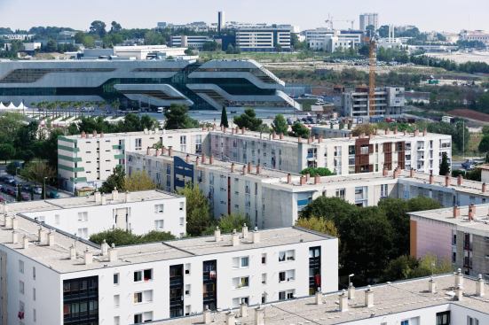 Pierresvives serves as an architectural bridge between the center of Montpellier and the outyling community of La Paillade, with its 25,000 residents, many of whom live in public housing. Some 900 new apartments are being constructed around Hadid’s concrete-and-glass structure.