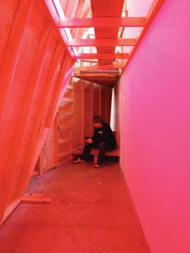 Architecture student Kyd Kitchaiya chills in the hot pink lounge areas tucked behind the dance floor.