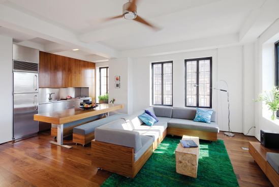 The unit features a simple palette of materials to convey a sense of calm and relaxation.