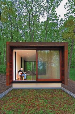 A green roof tops the below-grade section.