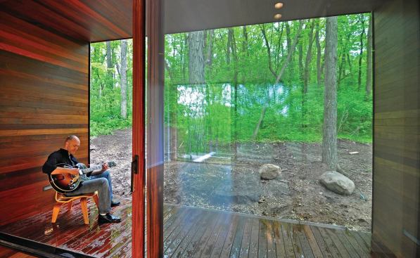 The porch provides a sheltered outdoor picking perch.