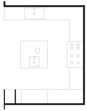 Architect Mark English designed the island to look and function as “a single piece of equipment.” Its square shape matches the room confi guration and maximizes workspace.