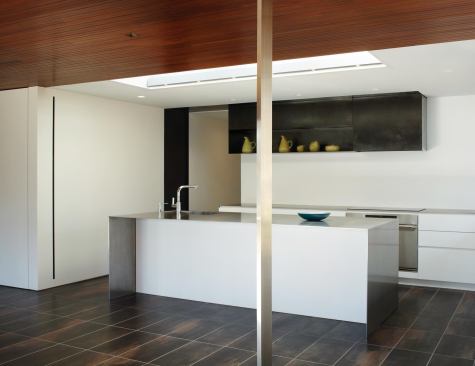 This remodeled kitchen represents an effort to project the vocabulary of Richard Neutra—the house’s original architect—into the present day.
