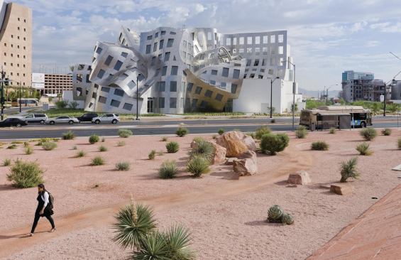 The Lou Ruvo Center for Brain Health in downtown Las Vegas is composed of two buildings—a revenue-generating event space and the clinic's research-and-treatment building—connected by a draped steel façade.