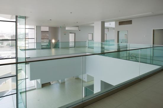 Inside the research building, double-height lobby spaces allow visitors to see into lab spaces, furthering the goal of opening the center to the community. 