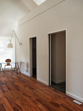 The home's private zones have lower ceilings to allow for the loft above.