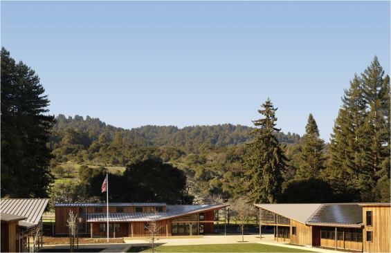 Portola Valley Town Center, which received LEED Platinum certification from the USGBC, includes rooftop photovoltaic panels, radiant heating, and natural ventilation strategies.