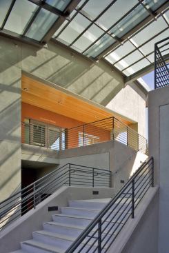At Orinda City Hall, a covered walkway connects two sections of the building and maintains a pre-existing pathway from points uphill to the downtown below.