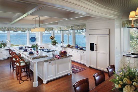 The kitchen was deliberately designed without any upper cabinets so that the view was unimpeded. With all that open water visible, the rooms seems to float, yachtlike, on the ocean.