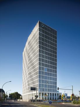 The building is clad in a load-bearing skin of concrete columns and beams, which were fabricated by Dreßler Bau.