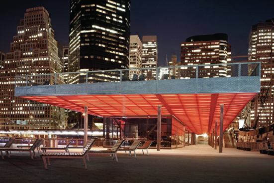 Linear fluorescents serve as the pavilion ceiling's source of illumination. Its glow provides enough light for the pier without interfering with the view of the city skyline.